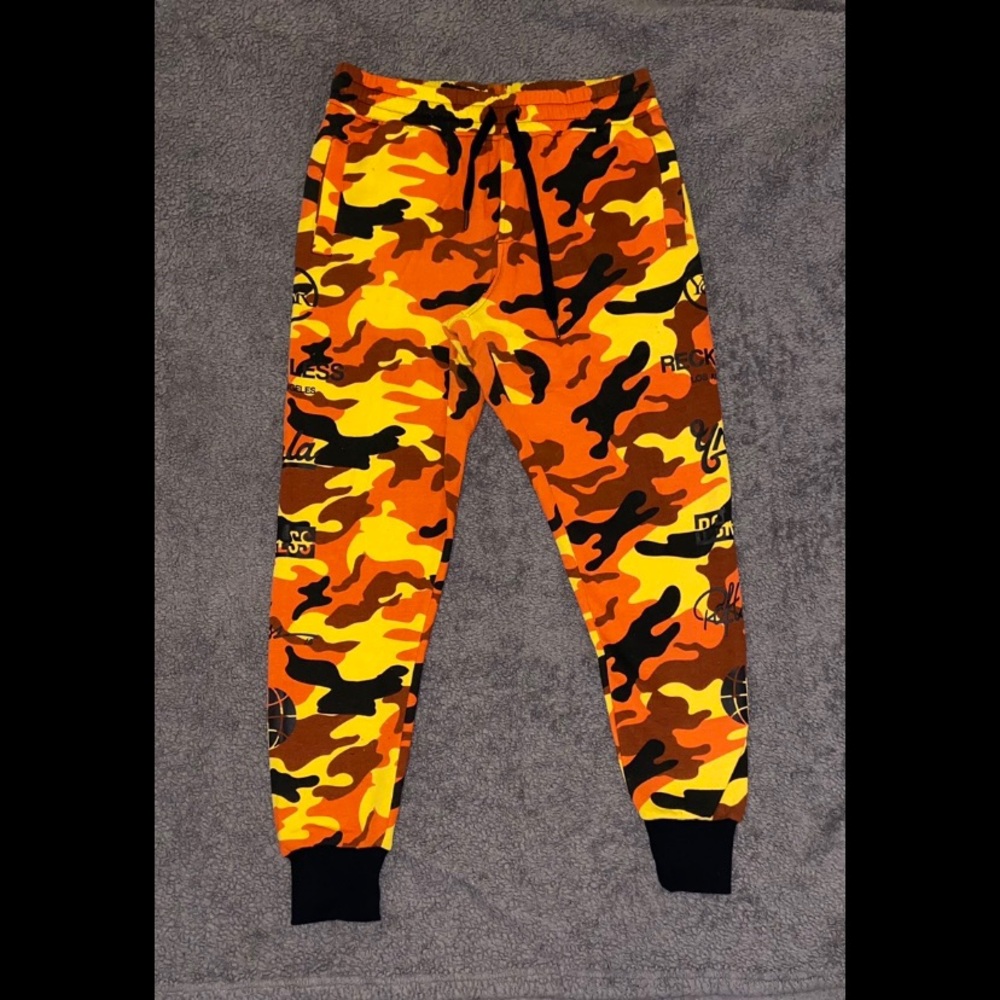 Young & Reckless Orange Camouflage Sweatpants with Multiple Logo Detailing